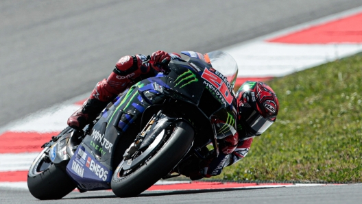 epa10517009 French Moto GP driver of Monster Energy Yamaha MotoGP Team Fabio Quartararo, in action on Yamaha during the training sessions at Algarve International Circuit, in Portimao, southern Portugal, 12 March 2023. The motorcyling season 2023 kicks off with the Grand Prix of Portugal on 26 March 2023.  EPA/LUIS FORRA