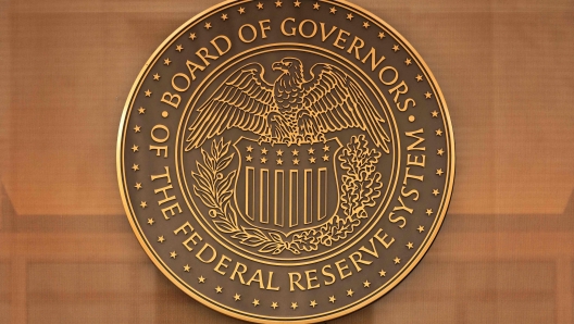 WASHINGTON, DC - MARCH 13: The seal of the Federal Reserve Board is seen outside its William McChesney Martin Building as they joined other government financial institutions to bail out Silicon Valley Bank's account holders after it collapsed on March 13, 2023 in Washington, DC. U.S. President Joe Biden tried to assure the public that the U.S. banking industry was safe following SVB's collapse and after New York regulators' forced closure of Signature Bank.   Alex Wong/Getty Images/AFP (Photo by ALEX WONG / GETTY IMAGES NORTH AMERICA / Getty Images via AFP)