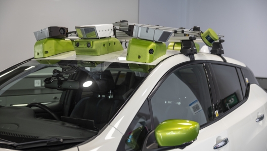 londra robotaxi guida autonoma nissan leaf