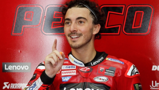 epa10458548 Italian MotoGP rider Francesco Bagnaia of Ducati Lenovo Team prepares in his team's garage during the MotoGP pre-season test session on the Sepang International Circuit, in Sepang, Malaysia, 10 February 2023.  EPA/FAZRY ISMAIL