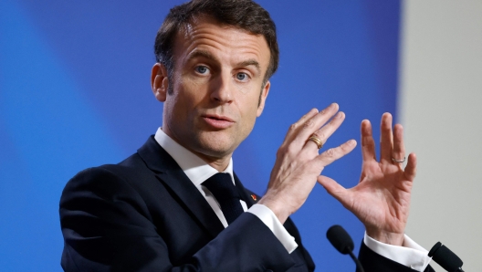 French President Emmanuel Macron speaks during a press conference after a EU Summit, at the EU headquarters in Brussels, on March 24, 2023. (Photo by Ludovic MARIN / AFP)