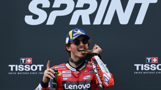 epa10542788 Italian MotoGP rider Francesco Bagnaia of Ducati Lenovo Team celebrates after winning the sprint race at Algarve International race track, Portimao, Portugal, 25 March 2023. The Motorcycling Grand Prix of Portugal will take place on 26 March 2023.  EPA/NUNO VEIGA