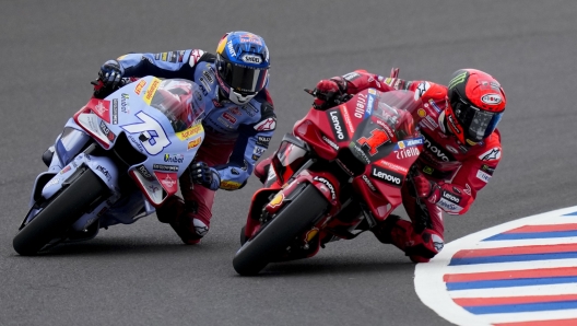 Italy's Francesco Bagnaia of Ducati Lenovo Team, right, and Spain's Alex Marquez of Ducati Gresini Racing MotoGP practice during Moto GP training session at the Termas de Rio Hondo circuit in Argentina, Friday, March 31, 2023. (AP Photo/Natacha Pisarenko)