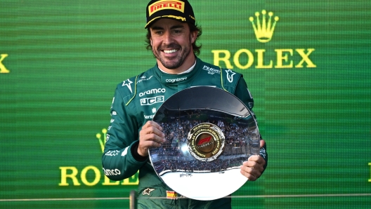 epa10555065 Fernando Alonso (ESP) of Aston Martin F1 Team celebrates his third place on the podium following the 2023 Formula One Grand Prix of Australia at the Albert Park Circuit in Melbourne, Australia, 02 April 2023.  EPA/JOEL CARRETT  AUSTRALIA AND NEW ZEALAND OUT