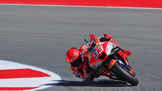 epa10542444 Spanish MotoGP rider Marc Marquez of Repsol Honda Team takes a bend during the qualifying for the Motorcycling Grand Prix of Portugal at Algarve International race track, Portimao, Portugal, 25 March 2023. The Motorcycling Grand Prix of Portugal will take place on 26 March 2023.  EPA/NUNO VEIGA