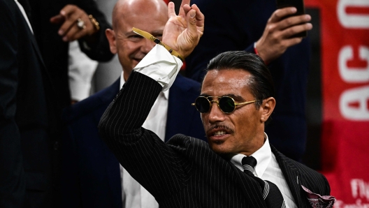 Turkish butcher, chef, food entertainer and restaurateur, Nusret Gok?e, nicknamed Salt Bae, attends the Italian Serie A football match between AC Milan and Napoli on September 18, 2022 at the San Siro stadium in Milan. (Photo by MIGUEL MEDINA / AFP)