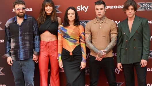 Da sin. il rapper Dargen D'Amico, l'attrice Ambra Angiolini, la cantante Francesca Michielin, il rapper e produttore musicale Fedez e il rapper e cantautore italiano Rkomi alla presentazione stampa dell'edizione di X Factor 2022, Milano, 13 settembre 2022. ANSA/DANIEL DAL ZENNARO