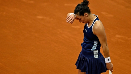 Italy's Martina Trevisan reacts during her 2023 WTA Tour Madrid Open tennis tournament singles match against US Jessica Pegula at the Caja Magica in Madrid on May 1, 2023. (Photo by OSCAR DEL POZO / AFP)