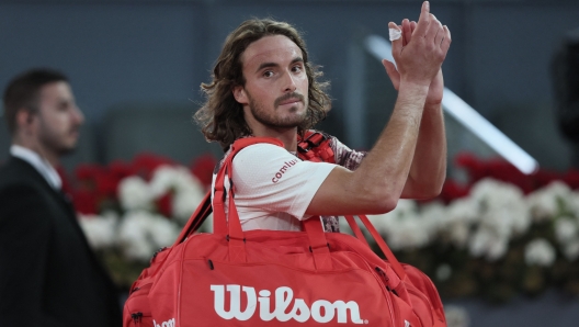 Greece's Stefanos Tsitsipas reacts after losing his 2023 ATP Tour Madrid Open tennis tournament singles quarter-final match against Germany's Jan-Lennard Struff at Caja Magica in Madrid on May 4, 2023. (Photo by Thomas COEX / AFP)