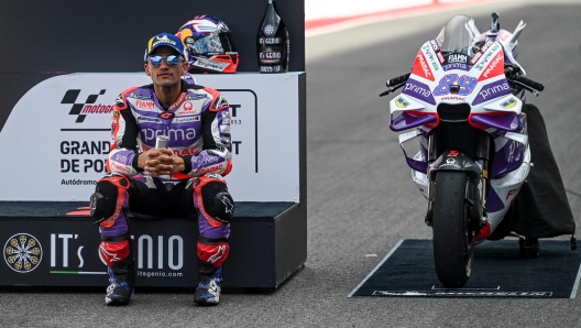 Second-placed Ducati Spanish rider Jorge Martin sits next to his motorbike after the sprint race of the MotoGP Portuguese Grand Prix at the Algarve International Circuit in Portimao, on March 25, 2023. (Photo by PATRICIA DE MELO MOREIRA / AFP)