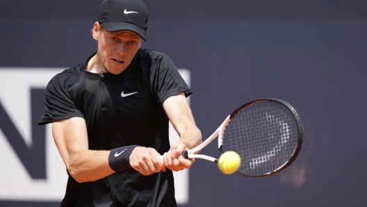 Italy's Jannik Sinner returns the ball to Australia's Thanasi Kokkinakis during their match at the Italian Open tennis tournament, in Rome, Friday, May 12, 2023. (AP Photo/Andrew Medichini)