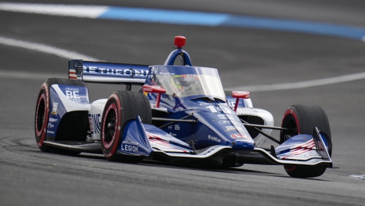 Alex Palou, of Spain, drives through a turn during the IndyCar auto race at Indianapolis Motor Speedway in Indianapolis, Saturday, May 13, 2023. (AP Photo/Michael Conroy)