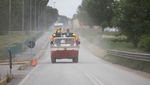 Firefighters during the rescue operations in San'Agata sul Santerno (Ravenna), 18 May 2023. A fresh wave of torrential rain is battering Italy, especially the northeastern region of Emilia-Romagna and other parts of the Adriatic coast.ANSA/MAX CAVALLARI