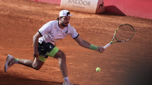 Giulio Zeppieri from Italy in action against Joao Sousa from Portugal in the Round of 32 at the Estoril Open tennis tournament in Estoril, Portugal, 04 April 2023.  EPA/MIGUEL A. LOPES