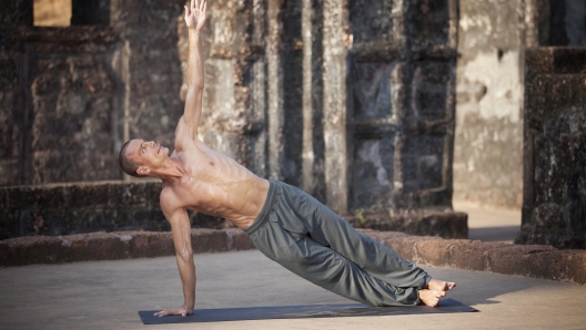 Beautiful yoga position at the ruins of India.