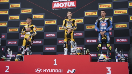 MISANO ADRIATICO, ITALY - JUNE 03: (L-R)  Michael Ruben Rinaldi of Italy and Aruba.it Racing - Ducati, Alvaro Bautista of Spain and Aruba.it Racing - Ducati and  Toprak Razgatlioglu of Turkey and Pata Yamaha Promoteon WorldSBK celebrate on the podium during the Superbike race 1 during the WorldSBK Round 5 - Misano Adriatico: Race 1 at Misano World Circuit on June 03, 2023 in Misano Adriatico, Italy. (Photo by Mirco Lazzari gp/Getty Images)