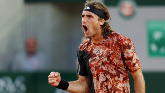 PARIS, FRANCE - JUNE 02: Stefanos Tsitsipas of Greece celebrates winning match point against Diego Schwartzman of Argentina during the Men's Singles Third Round match on Day Six of the 2023 French Open at Roland Garros on June 02, 2023 in Paris, France. (Photo by Clive Brunskill/Getty Images)