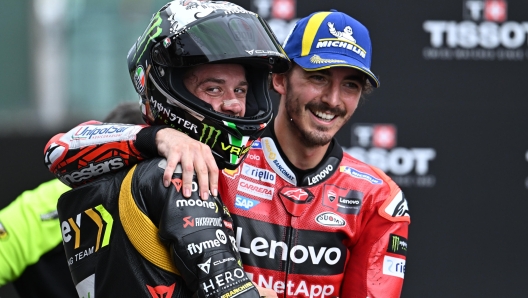 Italian rider Francesco Bagnaia of Ducati Lenovo Team (R) and Italian rider Marco Bezzecchi of Mooney VR46 Racing Team celebrates after Sprint Race of the Motorcycling Grand Prix of Italy at the Mugello circuit in Scarperia, central Italy, 10 June 2023. ANSA/CLAUDIO GIOVANNINI