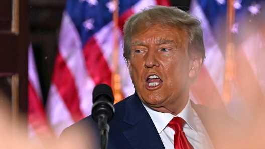 TOPSHOT - Former US President Donald Trump gestures after delivering remarks at Trump National Golf Club Bedminster in Bedminster, New Jersey, on June 13, 2023. Trump appeared in court in Miami for an arraignment regarding 37 federal charges, including violations of the Espionage Act, making false statements, and conspiracy regarding his mishandling of classified material after leaving office. (Photo by Ed JONES / AFP)