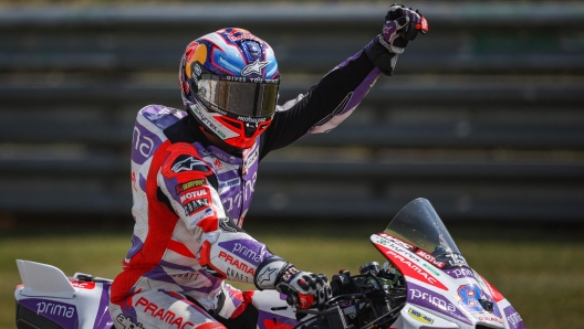 TOPSHOT - Ducati Pramac Racing Team's Spanish rider Jorge Martin celebrates after winning the Sprint race ahead of the MotoGP German motorcycle Grand Prix at the Sachsenring racing circuit in Hohenstein-Ernstthal near Chemnitz, eastern Germany, on June 17, 2023. (Photo by Ronny Hartmann / AFP)