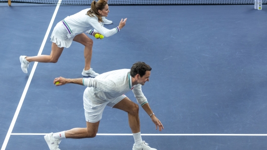 LONDON, ENGLAND - JUNE 24:  In this handout images released by Kensington Palace on June 24, 2023, Catherine, Princess of Wales and Wimbledon Champion Roger Federer join a ball boy and girl practice in the run up to The Championships 2023. In the AELTC Indoor Tennis Courts at The All England Lawn Tennis Club, Wimbledon, on June 8, 2023 in London, England. (Photo by Handout/Thomas Lovelock - AELTC via Getty Images)