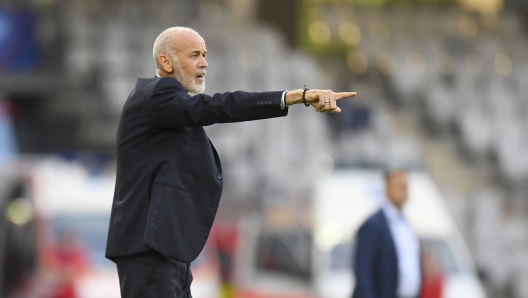 Italy's coach Paolo Nicolato reacts after his team conceded a goal during the Euro 2023 U21 Championship soccer match between Switzerland and Italy at the Cluj Arena stadium in Cluj, Romania, Sunday, June 25, 2023.(AP Photo/Raed Krishan)