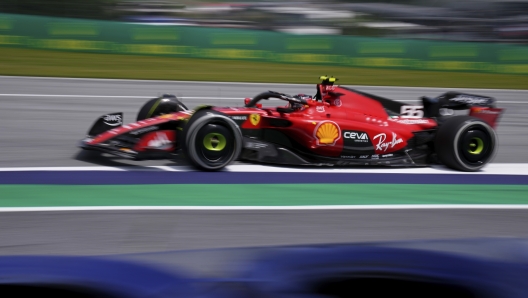 Ferrari driver Carlos Sainz of Spain steers his car during the first practice session ahead of Sunday's Formula One Austrian Grand Prix auto race, at the Red Bull Ring racetrack, in Spielberg, Austria, Friday, June 30, 2023. (AP Photo/Darko Bandic)