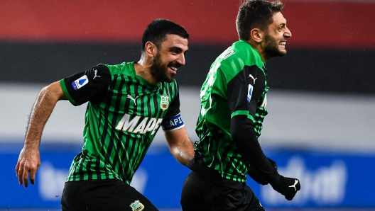 SassuoloÃ?s Italian forward Domenico Berardi (right) celebrates with his team-mate Italian midfielder Francesco Magnanelli after scoring a goal during the Italian Serie A soccer match Uc Sampdoria vs Us Sassuolo at Luigi Ferraris stadium in Genoa, Italy, 23 December 2020 ANSA/SIMONE ARVEDA