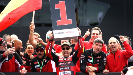 DONNINGTON, ENGLAND - JULY 02: Alvaro Bautista of Spain and Team Aruba.it Racing celebrates with his team after winning The WorldSBK Race 2 in the 2023 MOTUL FIM Superbike World Championships at Donnington Park on July 01, 2023 in Donnington, England. (Photo by Alex Pantling/Getty Images)