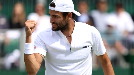 LONDON, ENGLAND - JULY 06: Matteo Berrettini of Italy celebrates against Lorenzo Sonego of Italy in the Men's Singles first round match during day four of The Championships Wimbledon 2023 at All England Lawn Tennis and Croquet Club on July 06, 2023 in London, England. (Photo by Clive Brunskill/Getty Images)