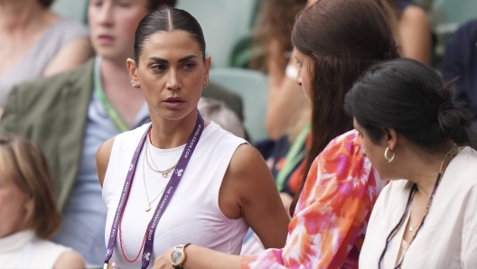 Melissa Satta, girlfriend of Matteo Berrettini, sits on Court No. 1 ahead of the men's singles match between Germany's Alexander Zverev and Italy's Matteo Berrettini on day six of the Wimbledon tennis championships in London, Saturday, July 8, 2023. (AP Photo/Alberto Pezzali)