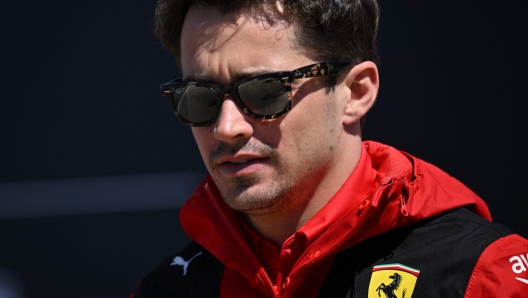 Ferrari's Monegasque driver Charles Leclerc arrives for the first practice session ahead of the Formula One British Grand Prix at the Silverstone motor racing circuit in Silverstone, central England on July 7, 2023. (Photo by ANDREJ ISAKOVIC / AFP)