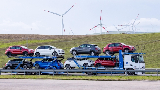 The cars produced in the Stellantis factory leave the Lucanian factory and are transported to the dealerships in San Nicola di Melfi (Potenza), 21 January 2021. About seven thousand people work in the Lucanian factory - where 500 X, Jeep Renegade and Compass are produced. ANSA / TONY VECE.