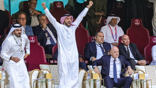 Saudi Crown Prince Mohammed bin Salman Al Saud celebrates the Saudi Arabia teams winning the match during the FIFA World Cup 2022, Group C football match between Argentina and Saudi Arabia on November 22, 2022 at Lusail Stadium in Al Daayen, Qatar - Photo Nigel Keene / ProSportsImages / DPPI (Photo by Nigel Keene / ProSportsImages / DPPI via AFP)