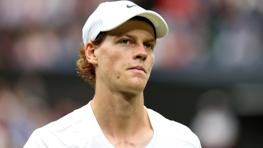 LONDON, ENGLAND - JULY 14: Jannik Sinner of Italy reacts during the Men's Singles Semi Final against Novak Djokovic of Serbia on day twelve of The Championships Wimbledon 2023 at All England Lawn Tennis and Croquet Club on July 14, 2023 in London, England. (Photo by Clive Brunskill/Getty Images)