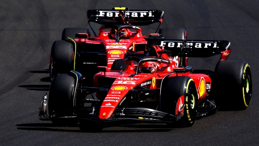 BUDAPEST, HUNGARY - JULY 23: Charles Leclerc of Monaco driving the (16) Ferrari SF-23 leads Carlos Sainz of Spain driving (55) the Ferrari SF-23  during the F1 Grand Prix of Hungary at Hungaroring on July 23, 2023 in Budapest, Hungary. (Photo by Mark Thompson/Getty Images)