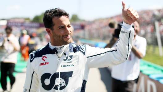 BUDAPEST, HUNGARY - JULY 23: Daniel Ricciardo of Australia and Scuderia AlphaTauri prepares to drive on the grid prior to the F1 Grand Prix of Hungary at Hungaroring on July 23, 2023 in Budapest, Hungary. (Photo by Peter Fox/Getty Images)