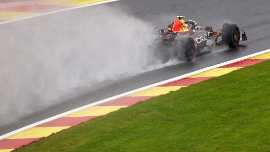 SPA, BELGIUM - JULY 28: Sergio Perez of Mexico driving the (11) Oracle Red Bull Racing RB19 in the rain during practice ahead of the F1 Grand Prix of Belgium at Circuit de Spa-Francorchamps on July 28, 2023 in Spa, Belgium. (Photo by Francois Nel/Getty Images)