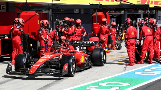 BUDAPEST, HUNGARY - JULY 23: Charles Leclerc of Monaco driving the (16) Ferrari SF-23 makes a pitstop during the F1 Grand Prix of Hungary at Hungaroring on July 23, 2023 in Budapest, Hungary. (Photo by Peter Fox/Getty Images)