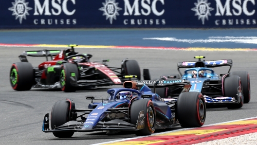 SPA, BELGIUM - JULY 30: Logan Sargeant of United States driving the (2) Williams FW45 Mercedes leads Pierre Gasly of France driving the (10) Alpine F1 A523 Renault and Zhou Guanyu of China driving the (24) Alfa Romeo F1 C43 Ferrari on track during the F1 Grand Prix of Belgium at Circuit de Spa-Francorchamps on July 30, 2023 in Spa, Belgium. (Photo by Peter Fox/Getty Images)