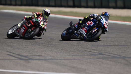 IMOLA, ITALY - JULY 15: Toprak Razgatlioglu of Turkey and Pata Yamaha Promoteon WorldSBK leads Alvaro Bautista of Spain and Aruba.it Racing - Ducati during the SuperBike race 1 during the 2023 MOTUL FIM Superbike World Championship - Prometeon Italian Round: Day Two on July 15, 2023 in Imola, Italy. (Photo by Mirco Lazzari gp/Getty Images)