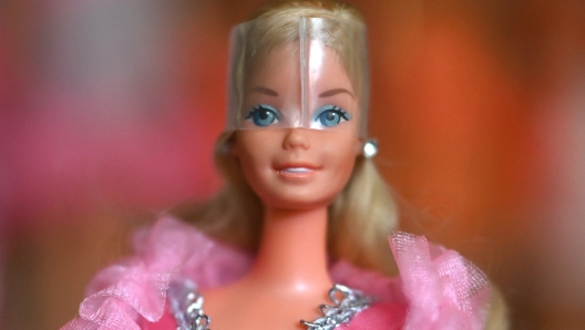 A photo shows the first Barbie doll with pink colours at the "Barbie clinic" of collector Bettina Dorfmann in Duesseldorf, western Germany on July 25, 2023. With her collection of 18,000 Barbies, German Bettina Dorfmann was already in the Guinness Book of Records since 2017. But the release of the "Barbie" movie last week has given new impetus to her collection dolls, which she exhibits in museums. (Photo by Ina FASSBENDER / AFP)