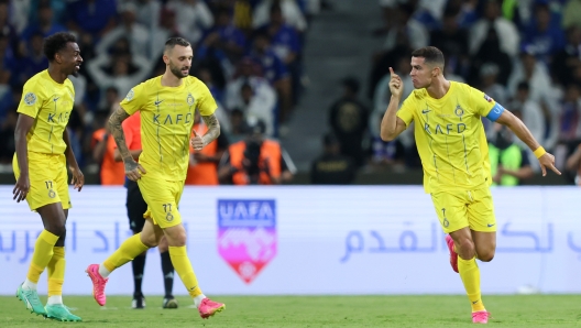 RIYADH, SAUDI ARABIA - AUGUST 12: Cristiano Ronaldo of Al Nassr celebrates after scoring the team's first goal during the Arab Club Champions Cup Final between Al Hilal and Al Nassr at King Fahd International Stadium on August 12, 2023 in Riyadh, Saudi Arabia. (Photo by Yasser Bakhsh/Getty Images)