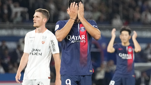 PSG's Goncalo Ramos reacts during the French League One soccer match between Paris Saint-Germain and Lorient at the Parc des Princes stadium in Paris, Saturday, Aug. 12, 2023. (AP Photo/Michel Euler)