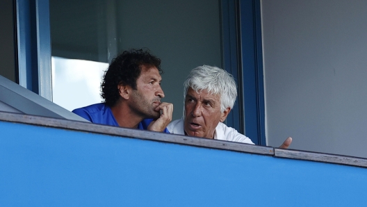 Atalanta's coach Gian Piero Gasperini (R) in the grandstand during the Italian Serie A soccer match US Sassuolo vs Atalanta BC at Mapei Stadium in Reggio Emilia, Italy, 20 August 2023. ANSA /SERENA CAMPANINI