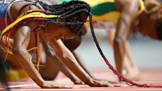 BUDAPEST, HUNGARY - AUGUST 20: Sha'Carri Richardson of Team United States competes in the Women's 100m Heats during day two of the World Athletics Championships Budapest 2023 at National Athletics Centre on August 20, 2023 in Budapest, Hungary. (Photo by Hannah Peters/Getty Images)