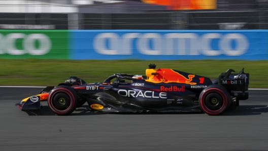 Dutch Formula One driver Max Verstappen of Red Bull Racing steers his car during the qualifying session ahead of Sunday's Formula One Dutch Grand Prix auto race, at the Zandvoort racetrack, in Zandvoort, Netherlands, Saturday, Aug. 26, 2023. (AP Photo/Peter Dejong)