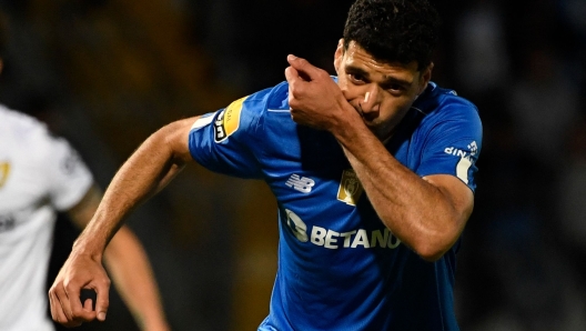 FC Porto's Iranian forward Mehdi Taremi celebrates after scoring his team's third goal during the Portuguese league football match between FC Famalicao and FC Porto at the Estadio Municipal 22 de Junho in Vila Nova de Famalicao on May 20, 2023. (Photo by MIGUEL RIOPA / AFP)