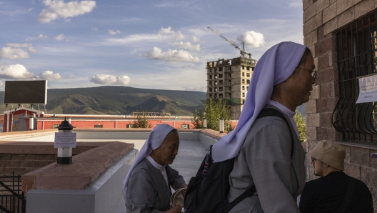 Catholic sisters enter Saints Peter and Paul Catholic Cathedral prior to a mass in Ulaanbaatar, Mongolia on Thursday, Aug. 31, 2023. Pope Francis is travelling to Mongolia to encourage one of the world?s smallest and newest Catholic communities. It's the first time a pope has visited the Asian country. (AP Photo/Louise Delmotte)