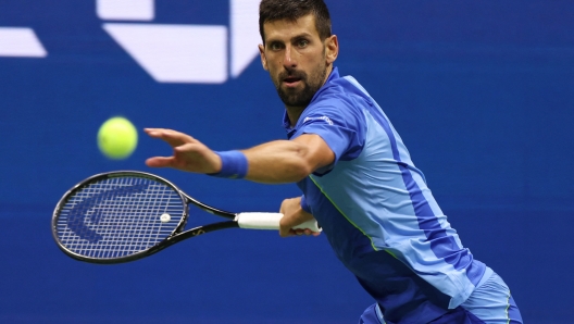 NEW YORK, NEW YORK - SEPTEMBER 01: Novak Djokovic of Serbia returns a shot against Laslo Djere of Serbia during their Men's Singles Third Round match on Day Five of the 2023 US Open at the USTA Billie Jean King National Tennis Center on September 01, 2023 in the Flushing neighborhood of the Queens borough of New York City.   Al Bello/Getty Images/AFP (Photo by AL BELLO / GETTY IMAGES NORTH AMERICA / Getty Images via AFP)